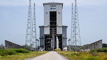The central core and two rocket boosters of Ariane 6 lifted into a vertical position at its launchpad in Kourou.