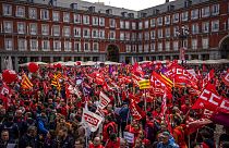 People gather during a protest to demand higher wages at the Mayor square in Madrid, Spain, Thursday, Nov. 3, 2022. 