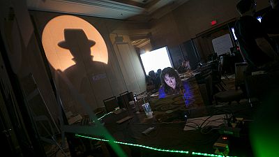 A Black Hat tech associate works in the network operating center (NOC) during the Black Hat information security conference at Mandalay Bay, Wednesday, July 26, 2017