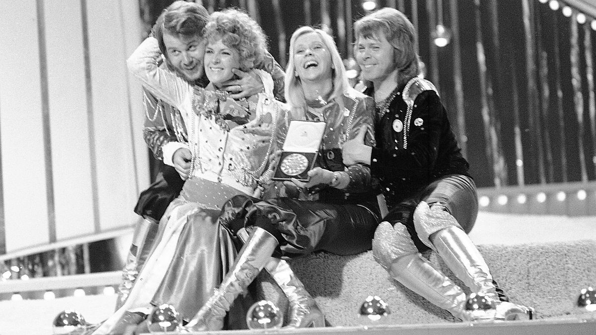 FILE - Swedish pop group ABBA celebrate winning the 1974 Eurovision Song Contest on stage at the Brighton Dome in England with their song Waterloo, April 6, 1974.