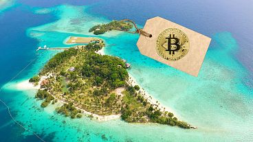 Malipano island, Philippines, Samal with a Bitcoin price tag 