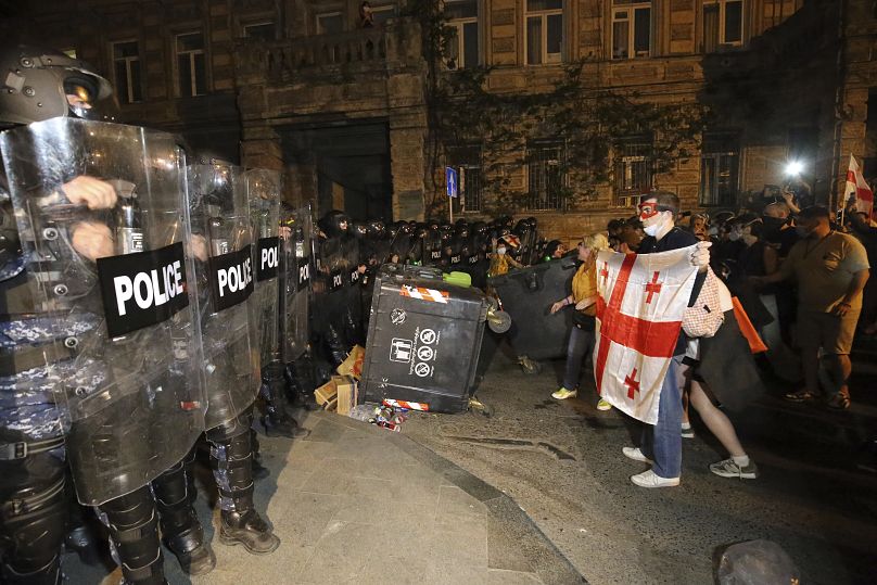 Riot police block opposition protesters gathered to protest against 'the Russian law' in Tbilisi, April 30, 2024