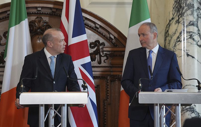 Northern Ireland Secretary Chris Heaton-Harris, left, and Tanaiste Micheal Martin hold a press conference in London April 29, 2024