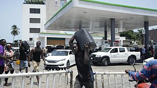 Faced with a shortage, Nigerians queue for hours for petrol as prices soar