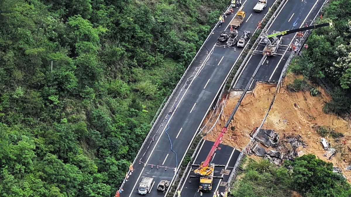 Rescuers work at the site of a collapsed road section of the Meizhou-Dabu Expressway in Meizhou, south China's Guangdong Province, Wednesday, May 1, 2024.
