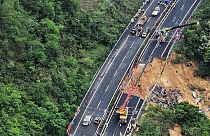 Rescuers work at the site of a collapsed road section of the Meizhou-Dabu Expressway in Meizhou, south China's Guangdong Province, Wednesday, May 1, 2024.