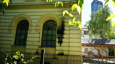 Fire damage on the façade of the Nożyk Synagogue in Warsaw, Poland.