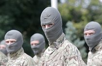 FILE - Masked Ukrainian soldiers in 2014.