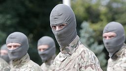 FILE - Masked Ukrainian soldiers in 2014.