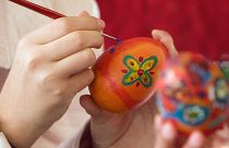 Students paint eggs for the upcoming Orthodox Easter