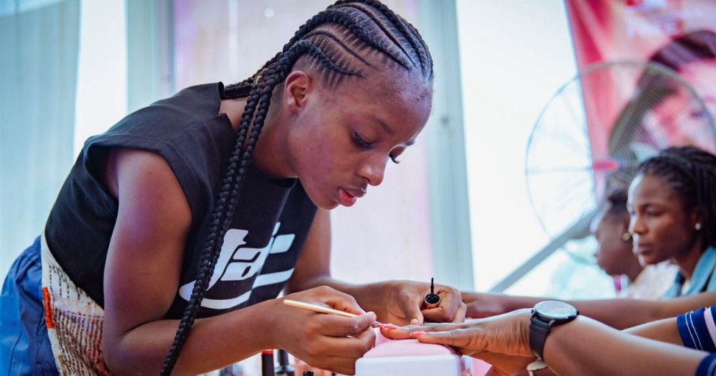 Nigerian Woman Tries to Break Guinness World Record by Painting Nails Non-Stop for Three Days.
