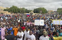Supporters of Niger's ruling junta gather for a protest called to fight for the country's freedom and push back against foreign interference, in Niamey, Niger, Aug. 3, 2023.
