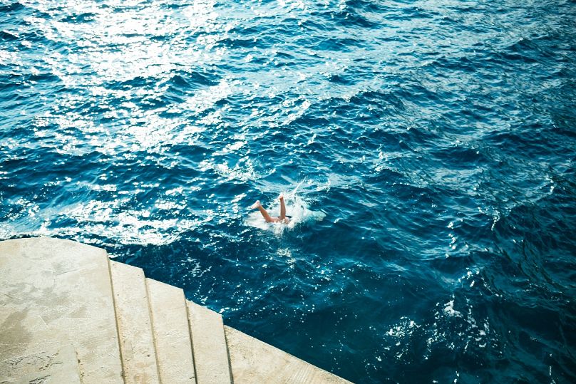 Dive in! Tourists love Croatia's naturaly beauty - like the water in Hvar, pictured here