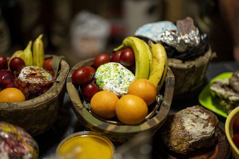 Food are gathered to be blessed during a Christian Orthodox Easter religious service at the 72nd Separate Mechanized Brigade compound, in Dnipropetrovsk region, Ukraine.