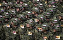 Russian soldiers march during the Victory Day military parade dress rehearsal at the Red Square in Moscow, Russia, Sunday, May 5, 2024.