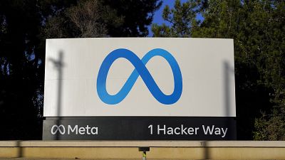 Meta's logo is seen on a sign at the company's headquarters.