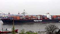 A ship arrives at the port of Hamburg, Germany