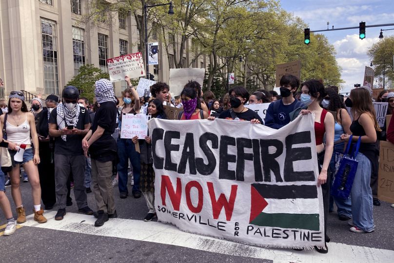 Pro-Palestinian protestors stand on Massachusetts Avenue near a student encampment on the MIT campus, in Cambridge, MA, May 2024