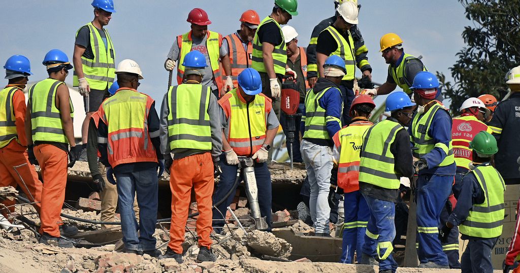 11 workers found alive beneath rubble after South Africa building collapse