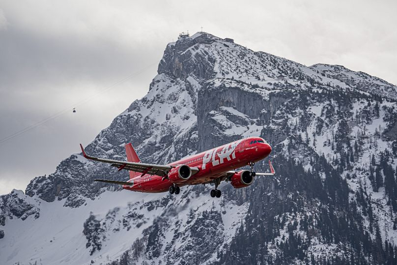 Great views: A Play Airlines craft flies past a mountain range