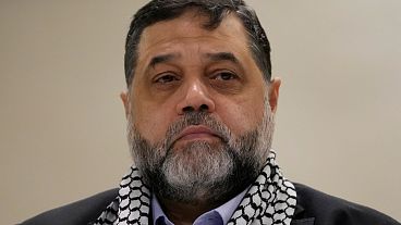 Osama Hamdan, a senior official with Palestinian Hamas group, attends a conference of the International Union of Resistance Clerics, in Beirut, Lebanon, Monday, March 4, 2024.