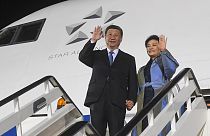 Chinese President Xi Jinping, left, and his wife Peng Liyuan wave during a welcome ceremony upon arrival at the Nikola Tesla airport in Belgrade, Serbia, Tuesday, May 7, 2024.