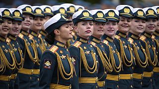 Russian servicewomen march during the Victory Day military parade in Moscow, Russia, Thursday, May 9, 2024.
