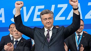 Prime Minister incumbent Andrej Plenkovic celebrates after claiming victory in a parliamentary election in Zagreb, Croatia, Thursday, April 18, 2024.