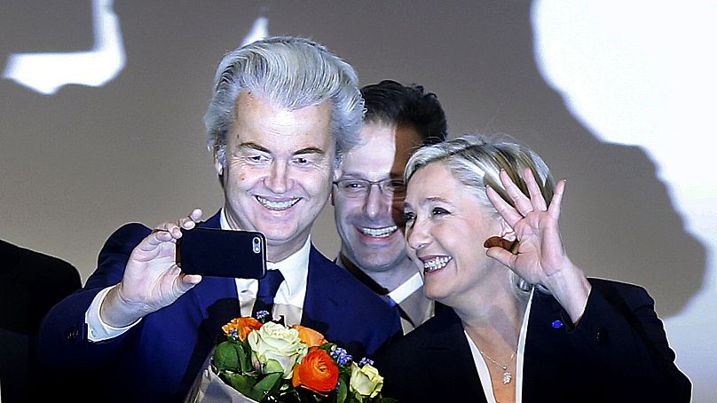 Geert Wilders (left) takes a selfie with Marine Le Pen (right) during a meeting of European Nationalists in Koblenz, Germany