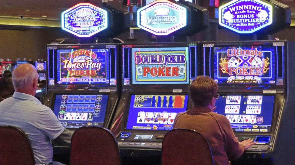Gamblers play slot machines at Harrah's casino in Atlantic City N.J., on Sept. 29, 2023. 