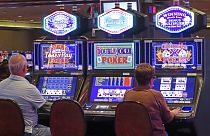 Gamblers play slot machines at Harrah's casino in Atlantic City N.J., on Sept. 29, 2023. 