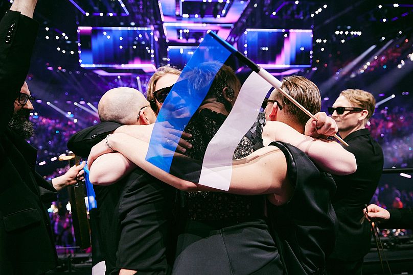 Estonia's 5MIINUUST x Puuluup celebrate after having booked a place in the Eurovision Song Contest Grand Final