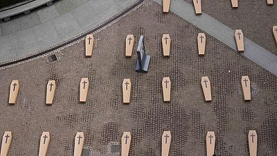 Milan piazza filled with mock coffins to protest workers' deaths, May 11th 2024