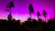Northern lights appear in the night sky over the Pferdskopf near Treisberg in the Hochtaunus district of Hesse, Germany, early Saturday, May 11, 2024.