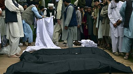 Dead bodies after heavy flooding in Baghlan province in northern Afghanistan Saturday, May 11, 2024. 