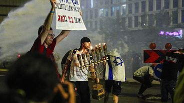 Police use water cannon to disperse anti-government demonstrators in Tel Aviv, May 11th 2024