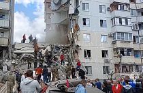 Derrumbe de un edifico tras impactar un bombardeo