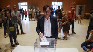 Socialist candidate Salvador Illa casts his vote