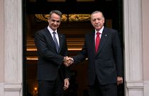 FILE - Greece's Prime Minister Kyriakos Mitsotakis, left, welcomes the Turkey's President Recep Tayyip Erdogan before their meeting at Maximos Mansion in Athens, Greece in 202