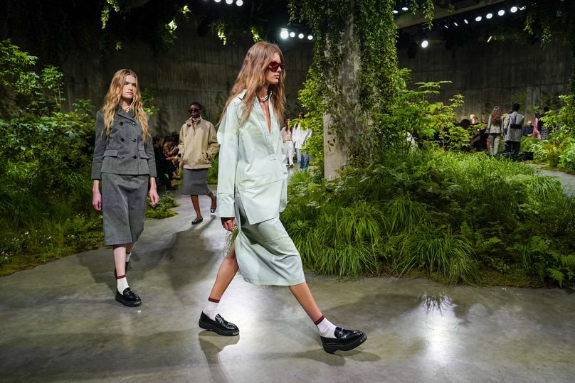 Models wear outfits for the Gucci Cruise fashion show in London, Monday, May 13, 2024.