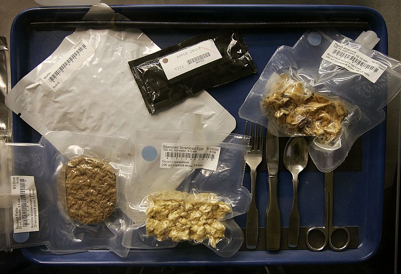 A sample astronauts meal is shown in a display case at the NASA Food Technology Commercial Space Center, Tuesday, June 7, 2005, at Iowa State University