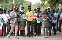 People protest against the recent increase in the electricity tariff, in Abuja Nigeria, Monday, May 13, 2024. 