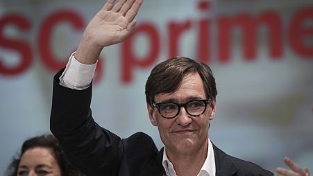 Socialist candidate Salvador Illa waves to supporters after the announcement of the results of the elections to the Catalan parliament in Barcelona, Sunday May 12, 2024.