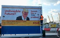 One of the satirical billboards with artwork by Darren Cullen put up ahead of the Shell AGM. 