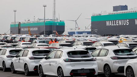 New cars wait to be transported on a dockyard in the Port of Antwerp-Bruges.