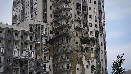 An apartment building damaged in the Russian missile attack in Kharkiv, Ukraine, Tuesday, May 14, 2024. (AP Photo/Andrii Marienko)