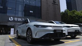 Leapmotor vehicles are parked outside a showroom in Hangzhou in eastern China's Zhejiang province on Tuesday, May 14, 2024.