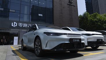 Leapmotor vehicles are parked outside a showroom in Hangzhou in eastern China's Zhejiang province on Tuesday, May 14, 2024.