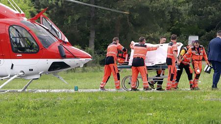 Rescue workers wheel Slovak Prime Minister Robert Fico, who was shot and injured, to a hospital in the town of Banska Bystrica, central Slovakia, Wednesday, May 15, 2024.