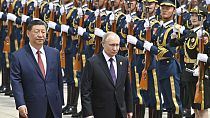  Putin review the honor guard during an official welcome ceremony in Beijing, China, Thursday, May 16, 2024..